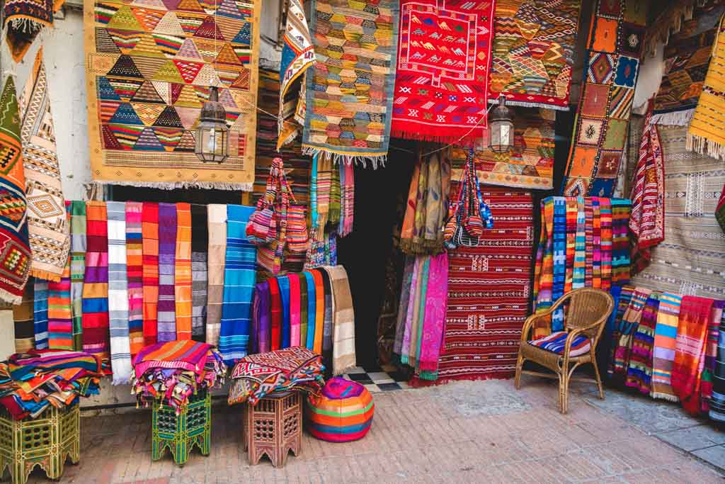 A shop covered in beautiful local designed rugs at the Agadir Souk.