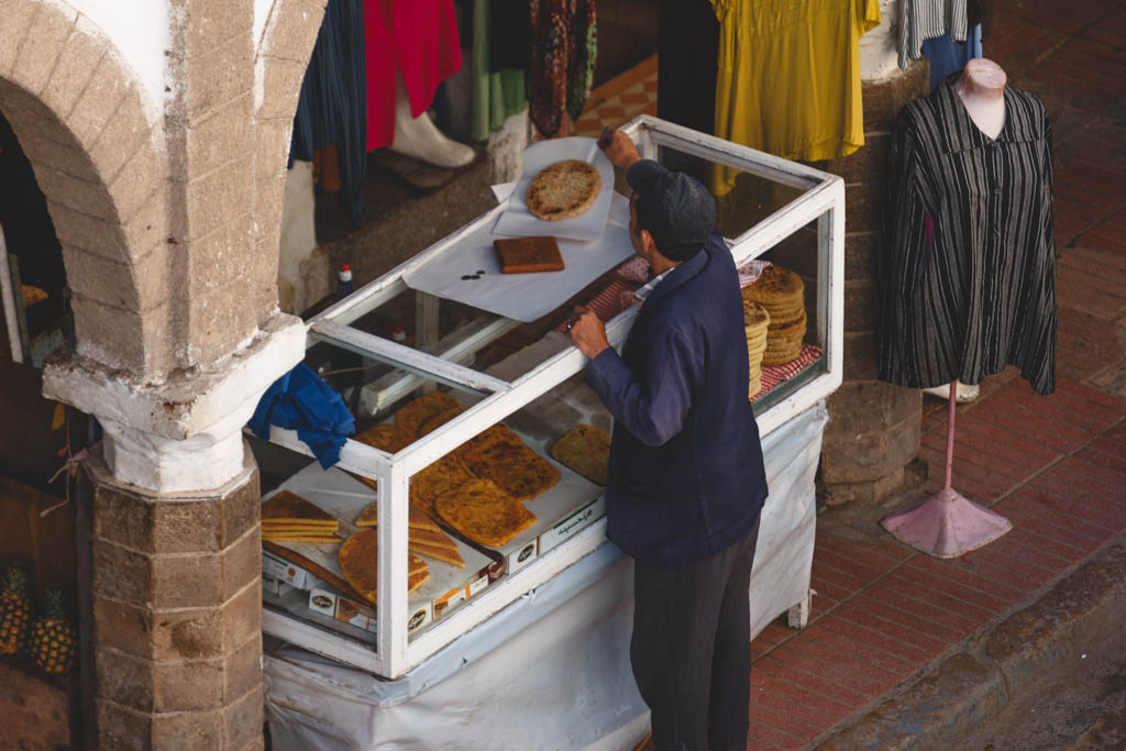 Street vendor selling Msmen in Morocco.