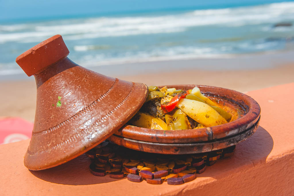 Nina and Garrett eating fish tagine in Morocco. 