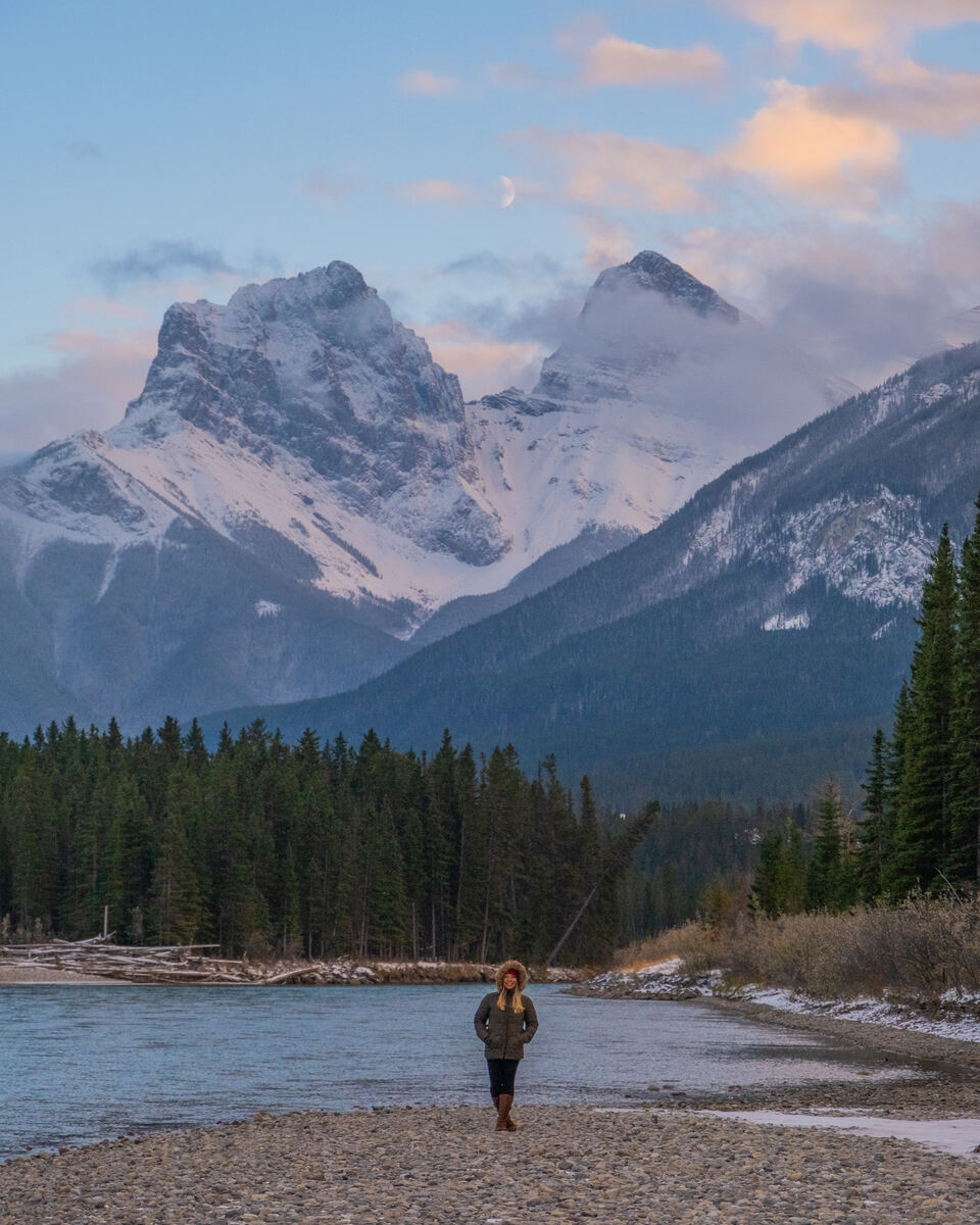 Natasha at Canmore, Alberta with lake below and mountain behind