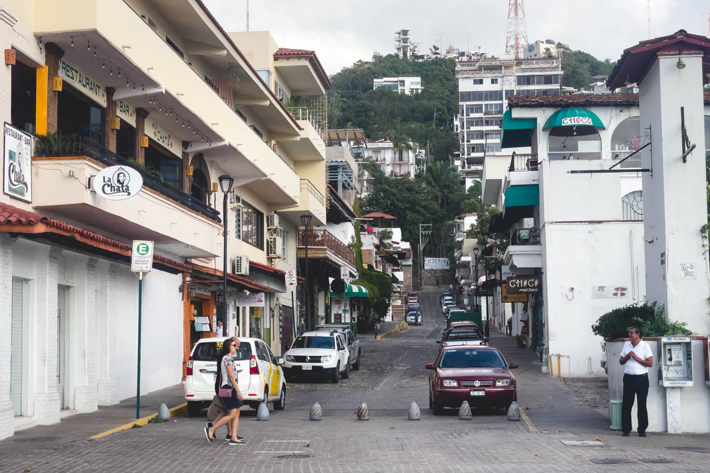 A view over a side street of Puerto Vallarta leading up a hill beside the choco museum.
