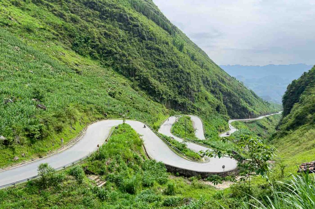The famous twisty mountain road view along the Ha Giang Loop.