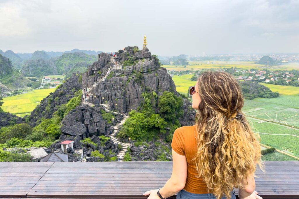 Nina looking at a temple in Ninh Binh.