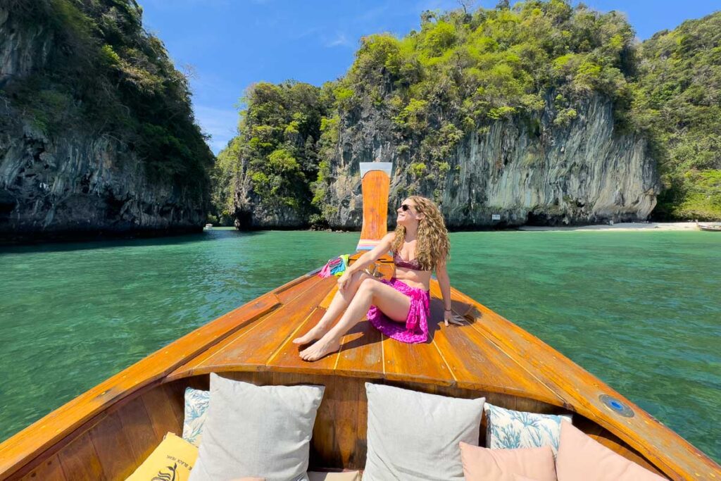 Nina at the front of the boat at Hong islands.