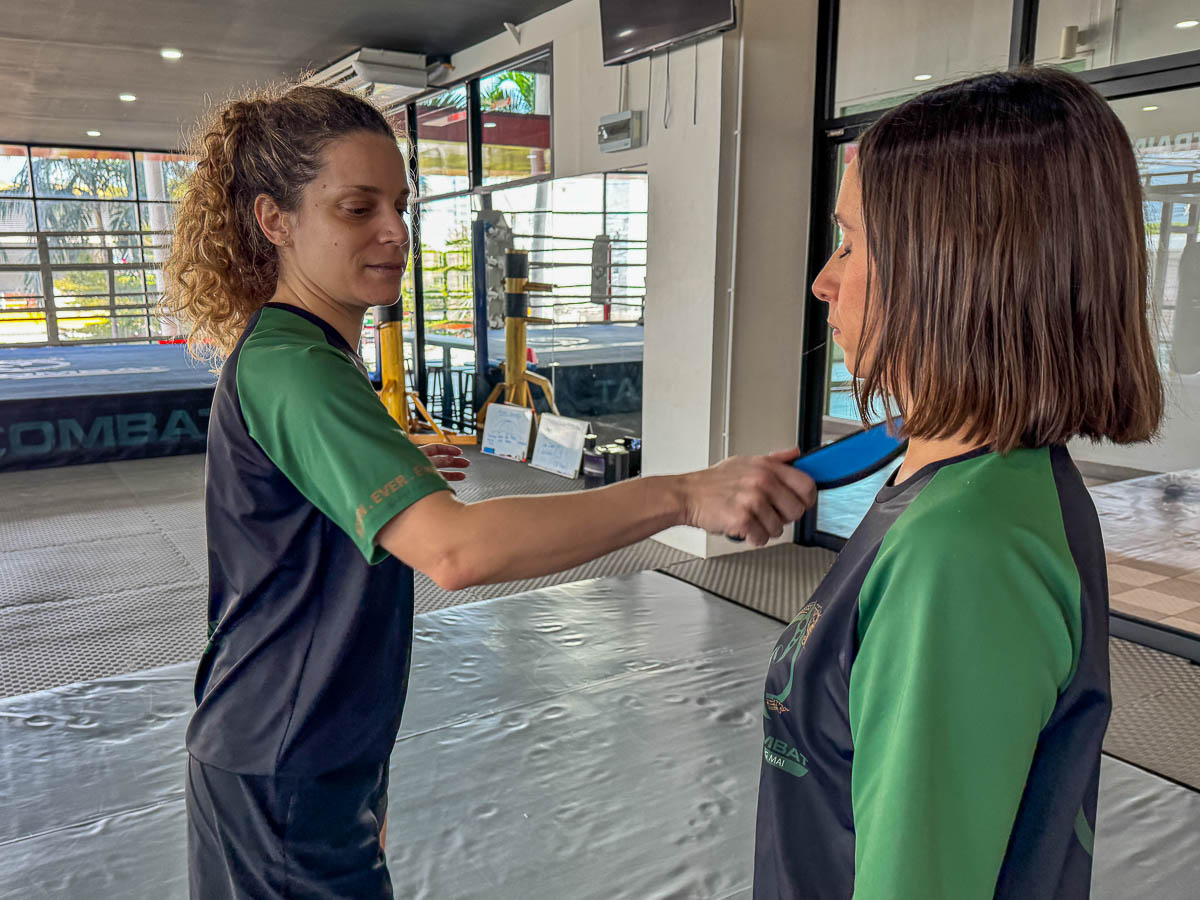 Nina with fake knife practicing self defense.