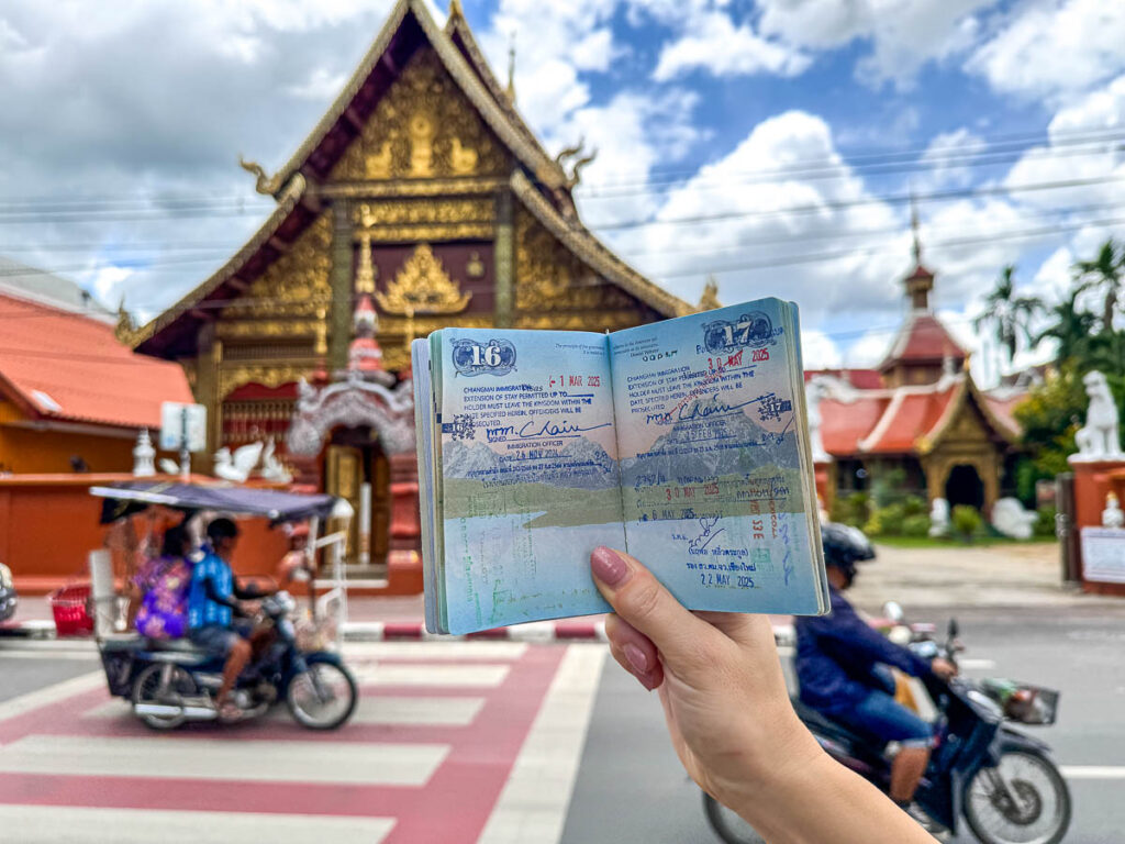 Passport open with temple in the back.