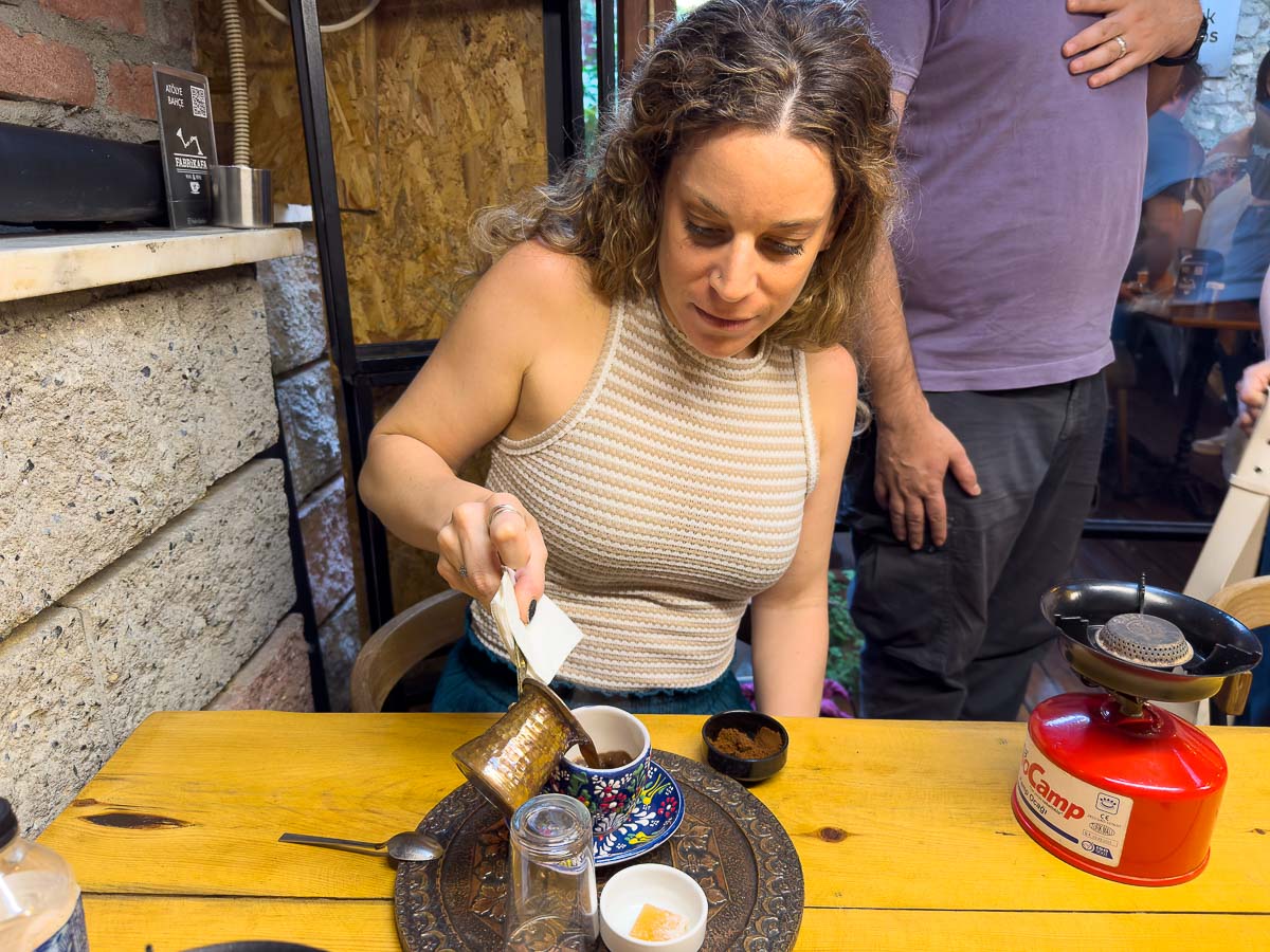 Istanbul coffee making Nina pouring coffee.