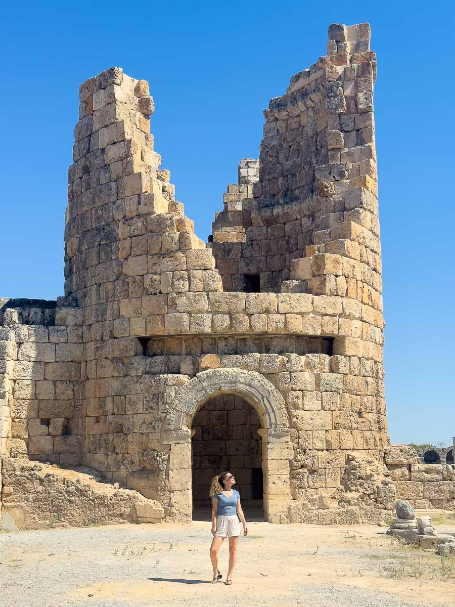 Perge ruins with Nina standing at a Column.