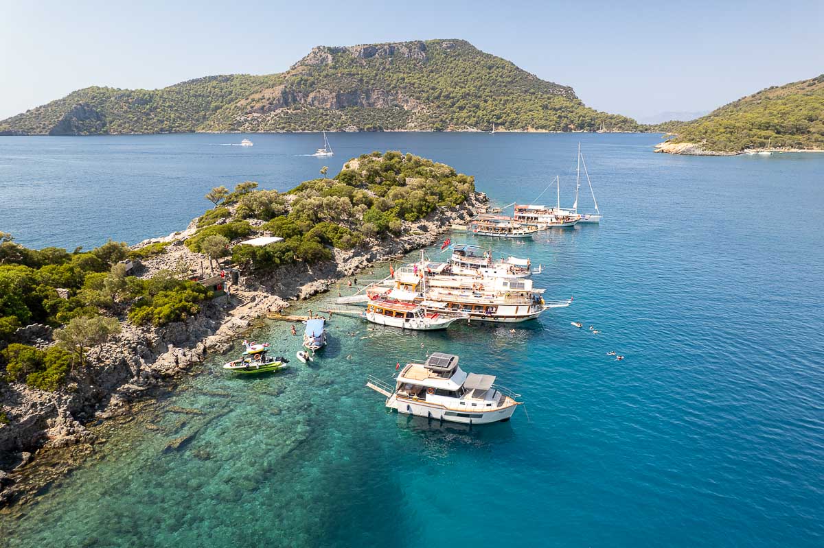 Boats in insane blue water.