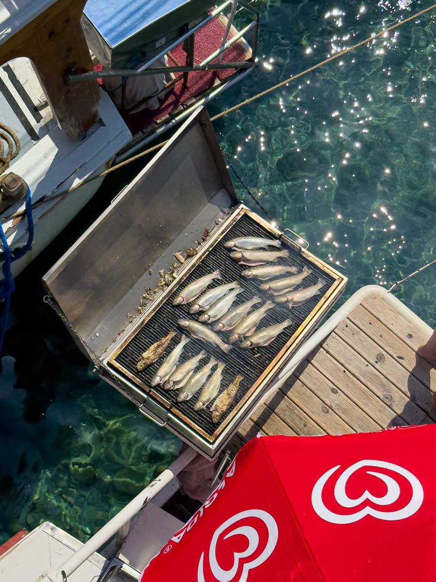 Grilled fish on boat.