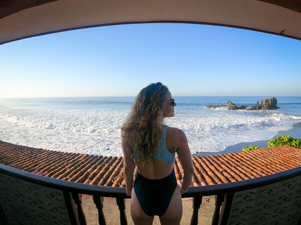 Nina standing at her hotel view.