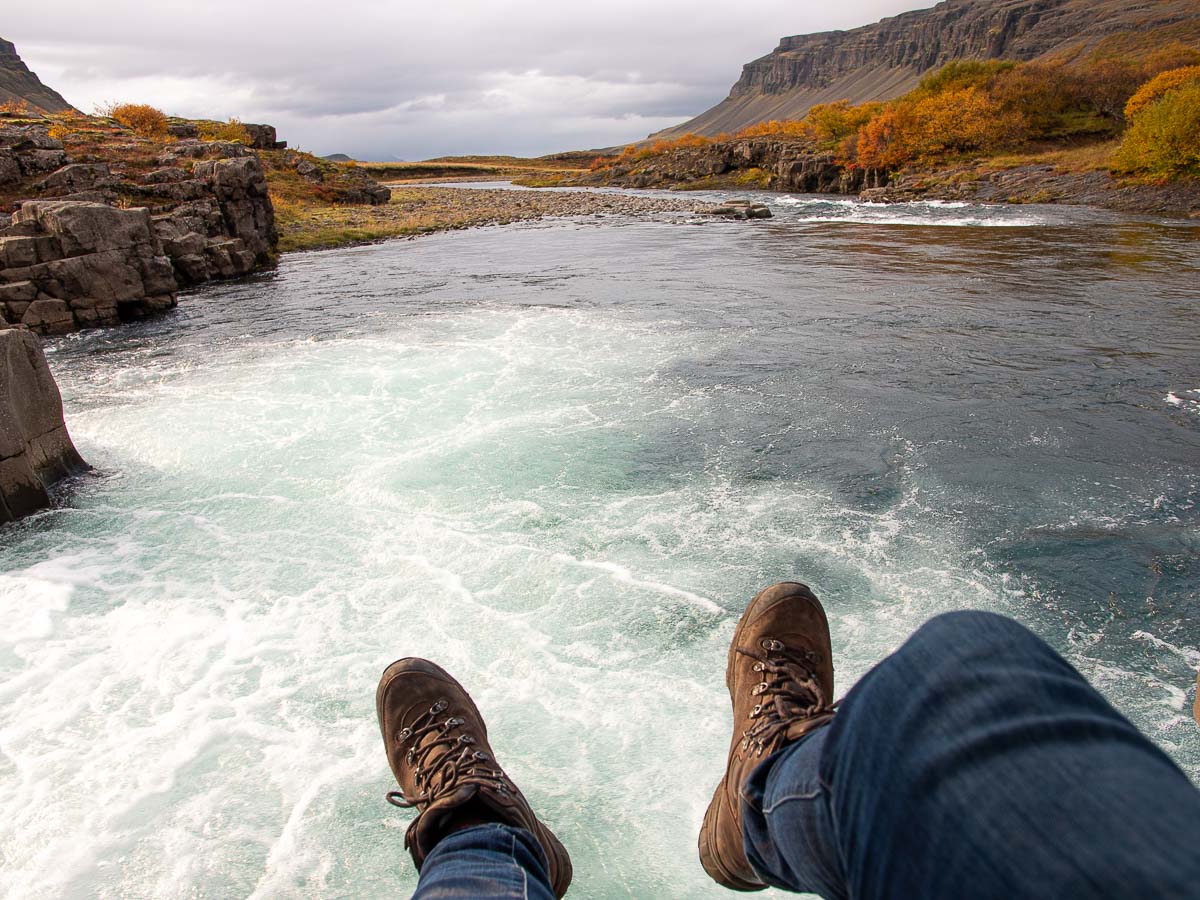 Garretts Boots over a waterfall in Iceland.