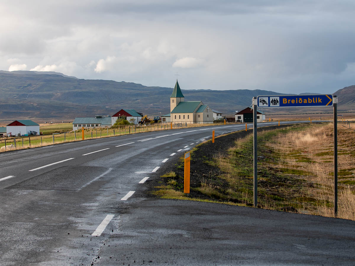 Iceland road with church.