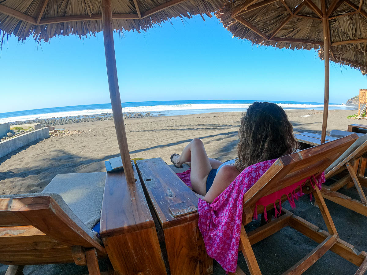 Nina in beach chair in Mizata Beach El Salvador.