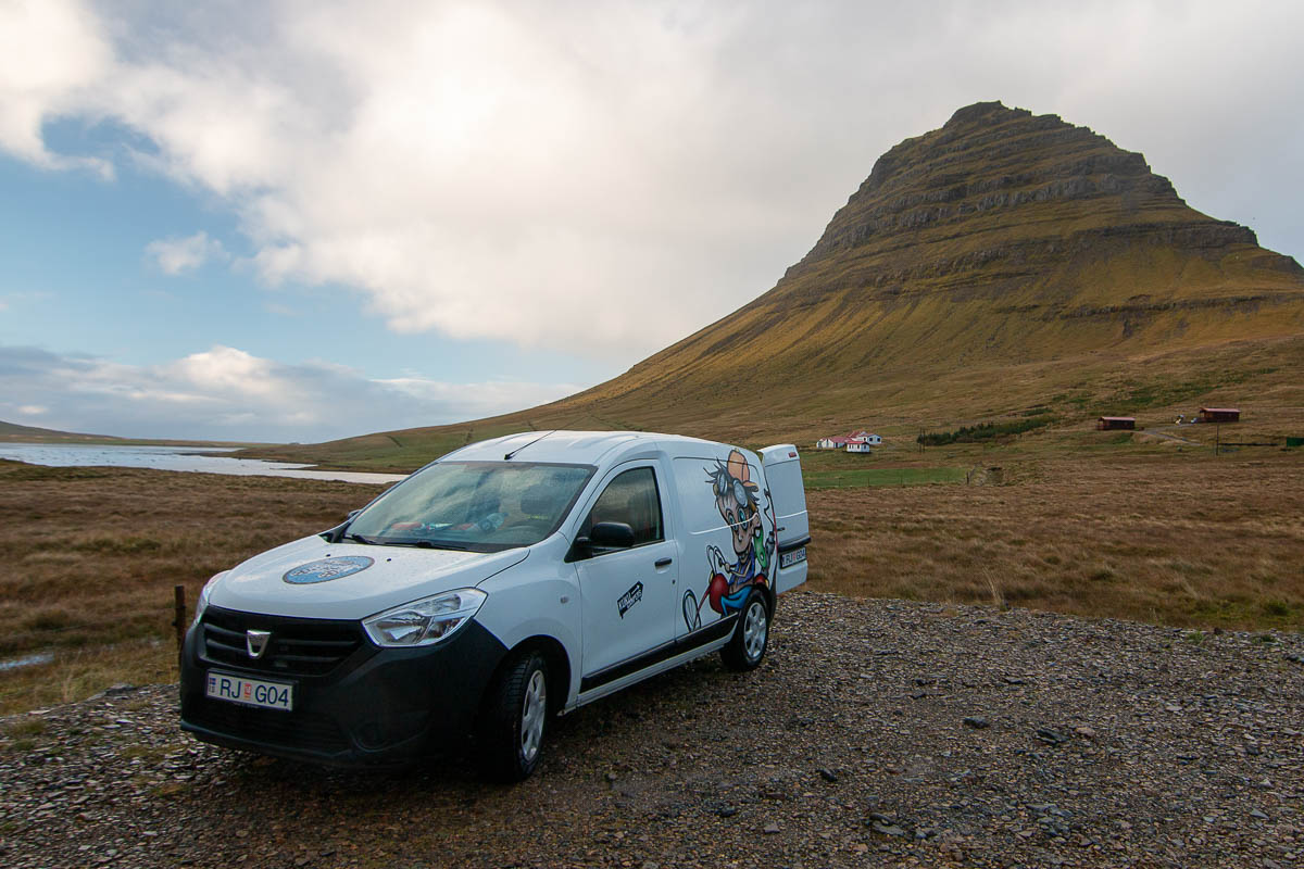 Van behind Kirkjufell mountain on Snaefellsnes Peninsula