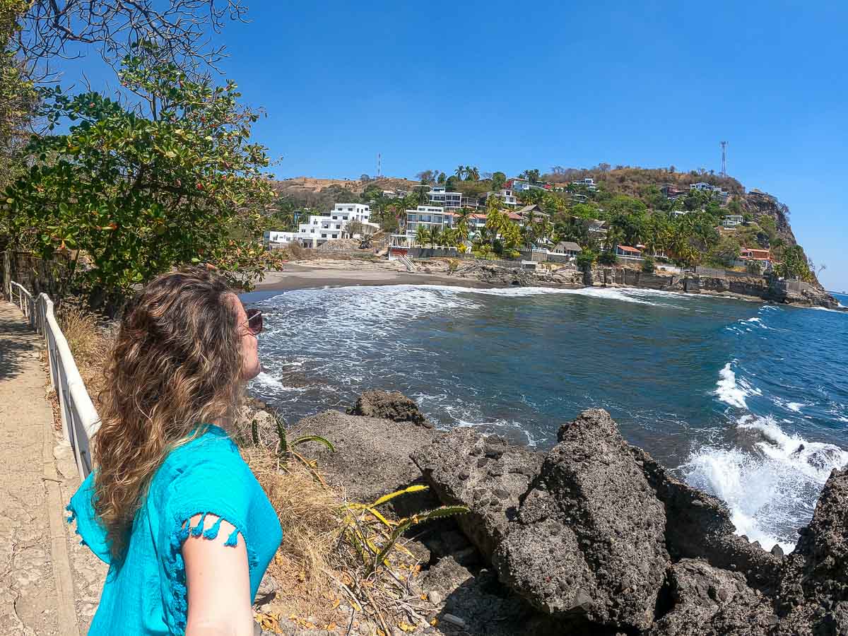 Nina over looking over at Atami beach on the left side with cliffside houses.
