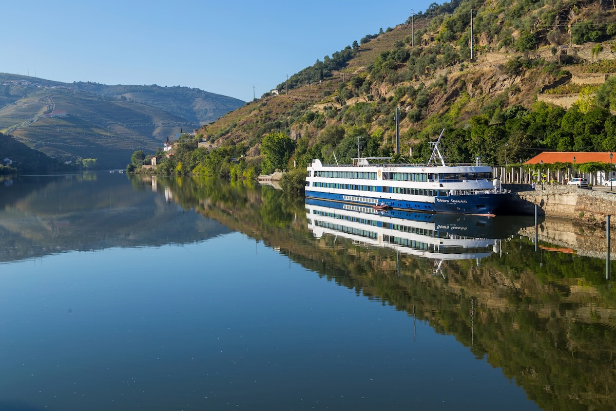 A river cruise boat touring the Douro River in Portugal