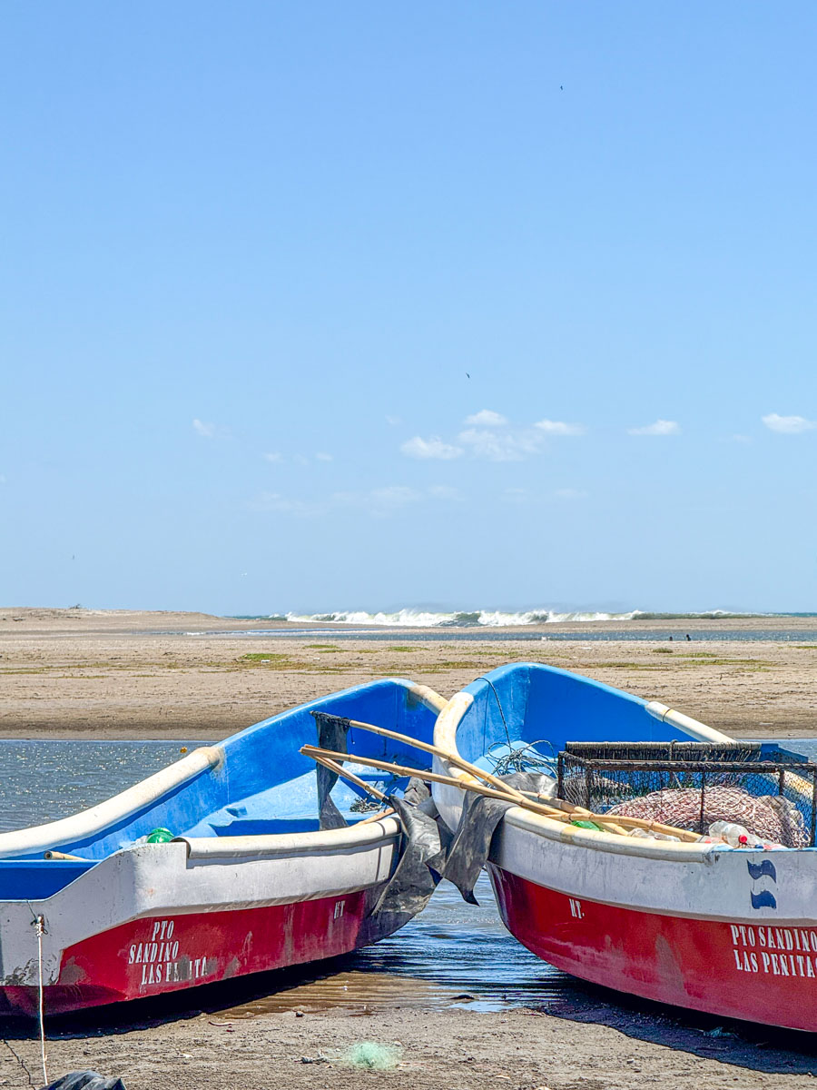 Two fishing boats on the beach at Las Peñitas, Nicaragua