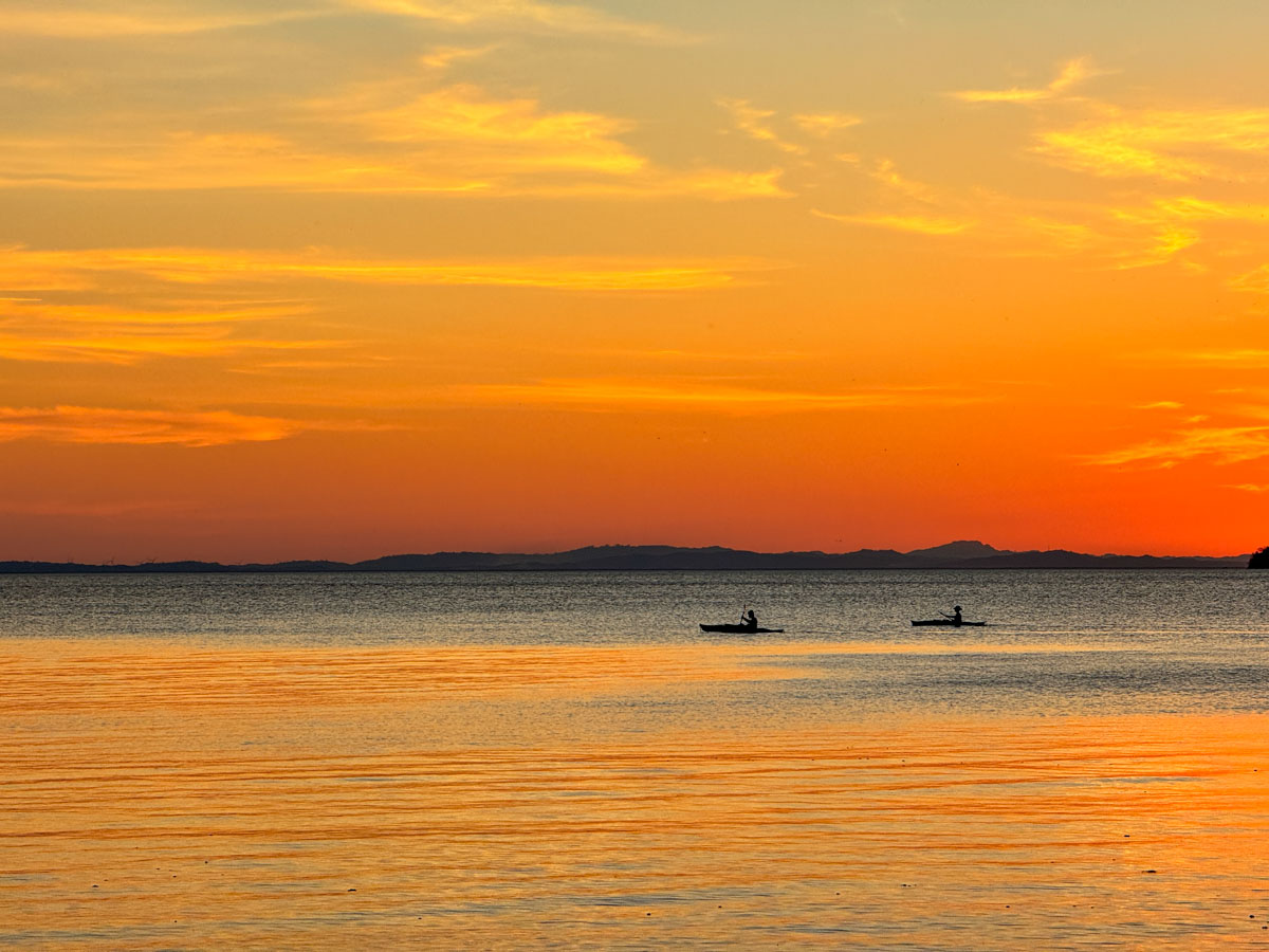 Two kayaks on a Mérida beach at sunset, Ometepe