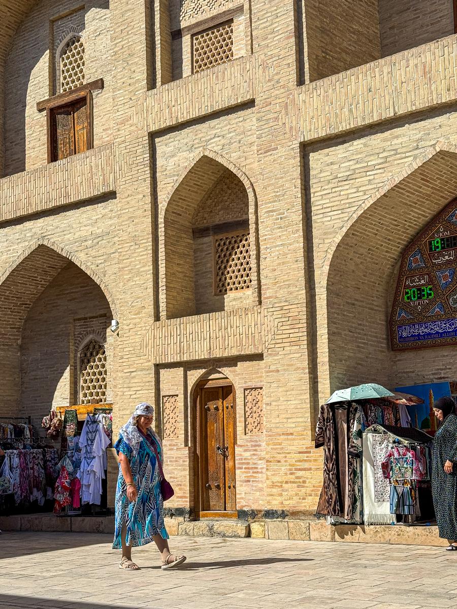 Carved wooden columns along the gallery at the Bahauddin Naqshband shrine near Bukhara, Uzbekistan
