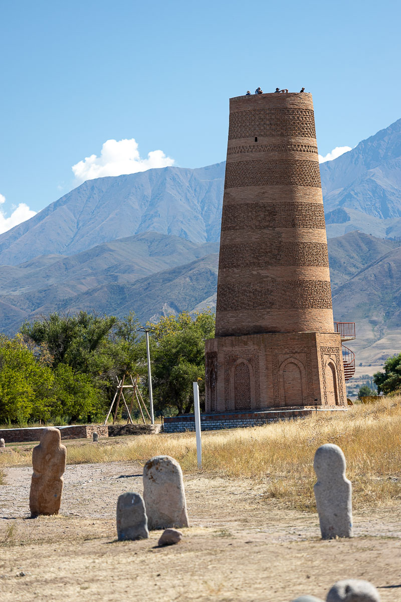 The 11th-century Burana Tower minaret with mountains behind, Kyrgyzstan
