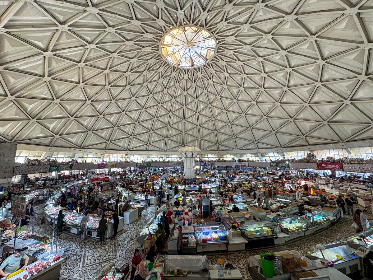 Market stalls under the giant dome of Chorsu Bazaar in Tashkent, Uzbekistan