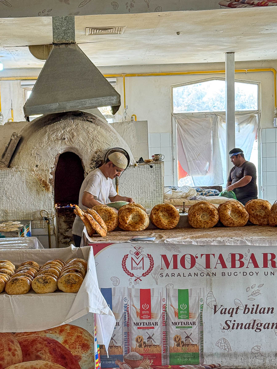 Fresh Uzbek bread being made at Chorsu Bazaar in Tashkent, Uzbekistan