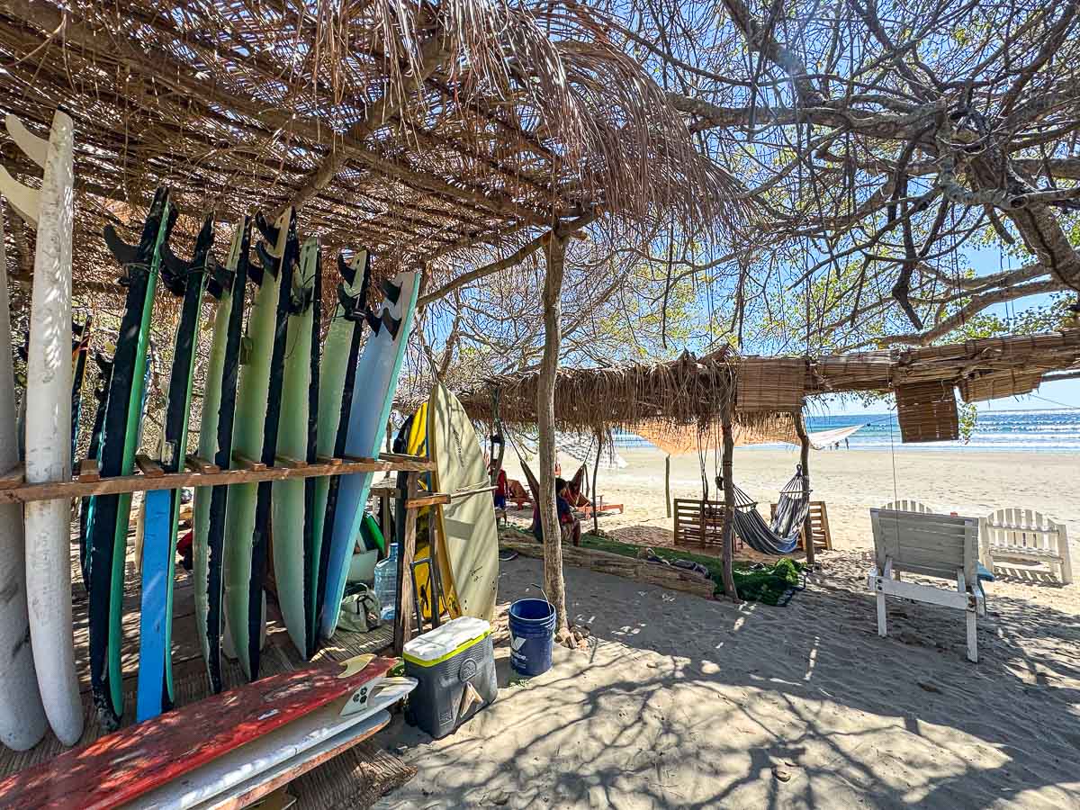 Rack of surfboards at Tribu Surf on Playa Hermosa