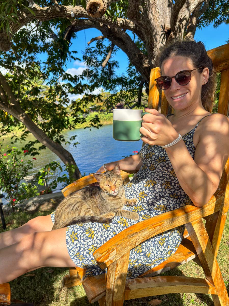 Nina with one of the resident cats on Isla Mirabel, Nicaragua