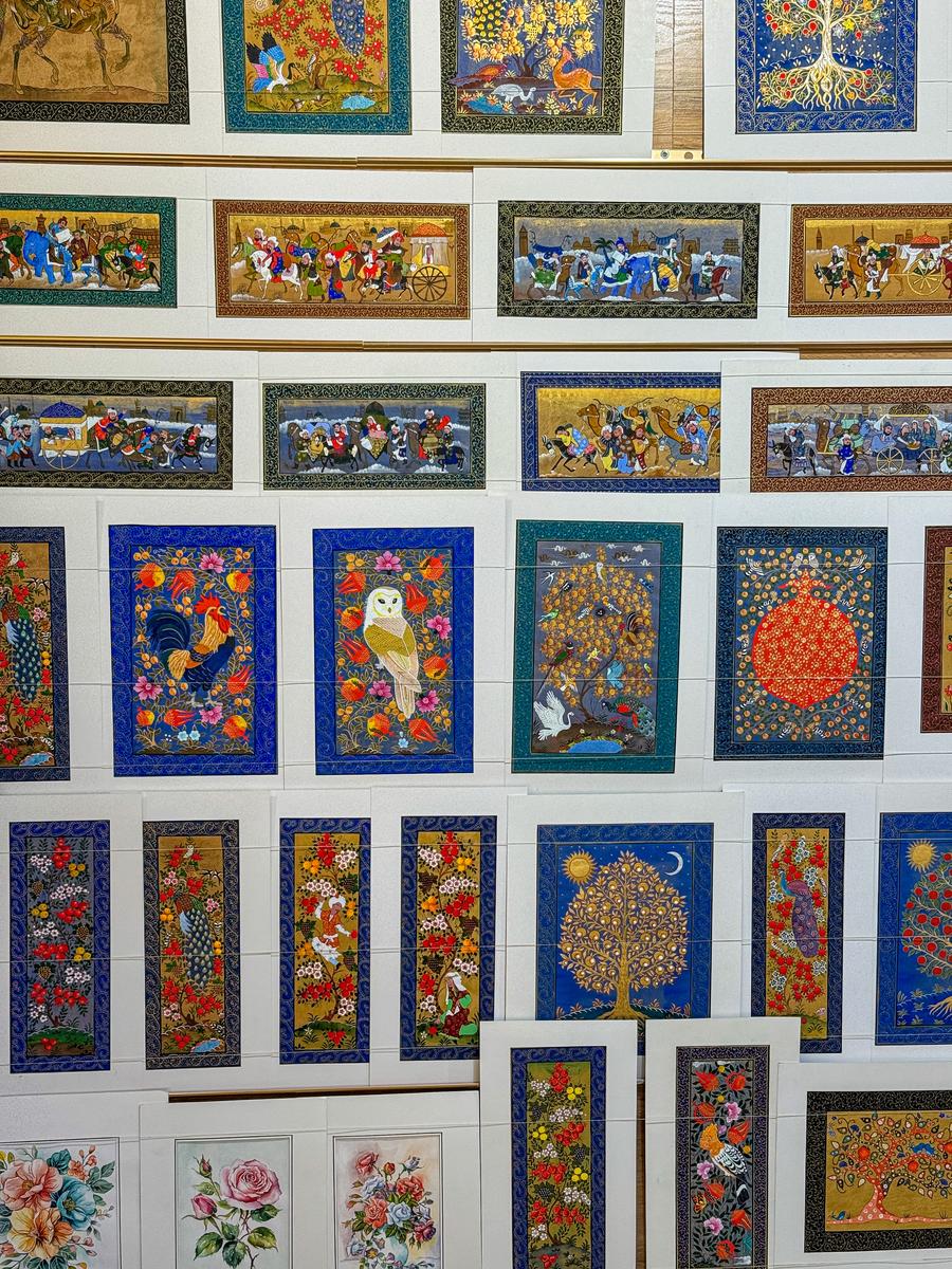 Wall of hand-painted miniature paintings at the Emir's Summer Palace near Bukhara, Uzbekistan