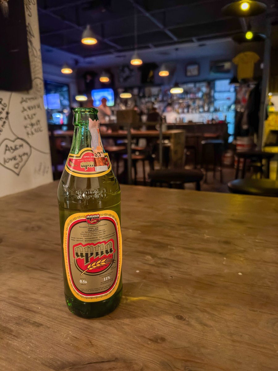 Bottle of Arpa, the local Kyrgyz beer, at No Name Bar in Bishkek, Kyrgyzstan