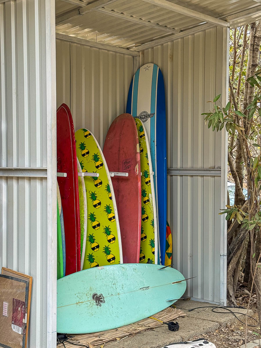 Surfboards racked up for rent near Beginner Bay, Popoyo