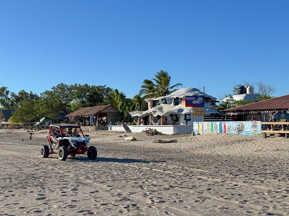 Dune buggy driving along a dirt road in Popoyo, Nicaragua