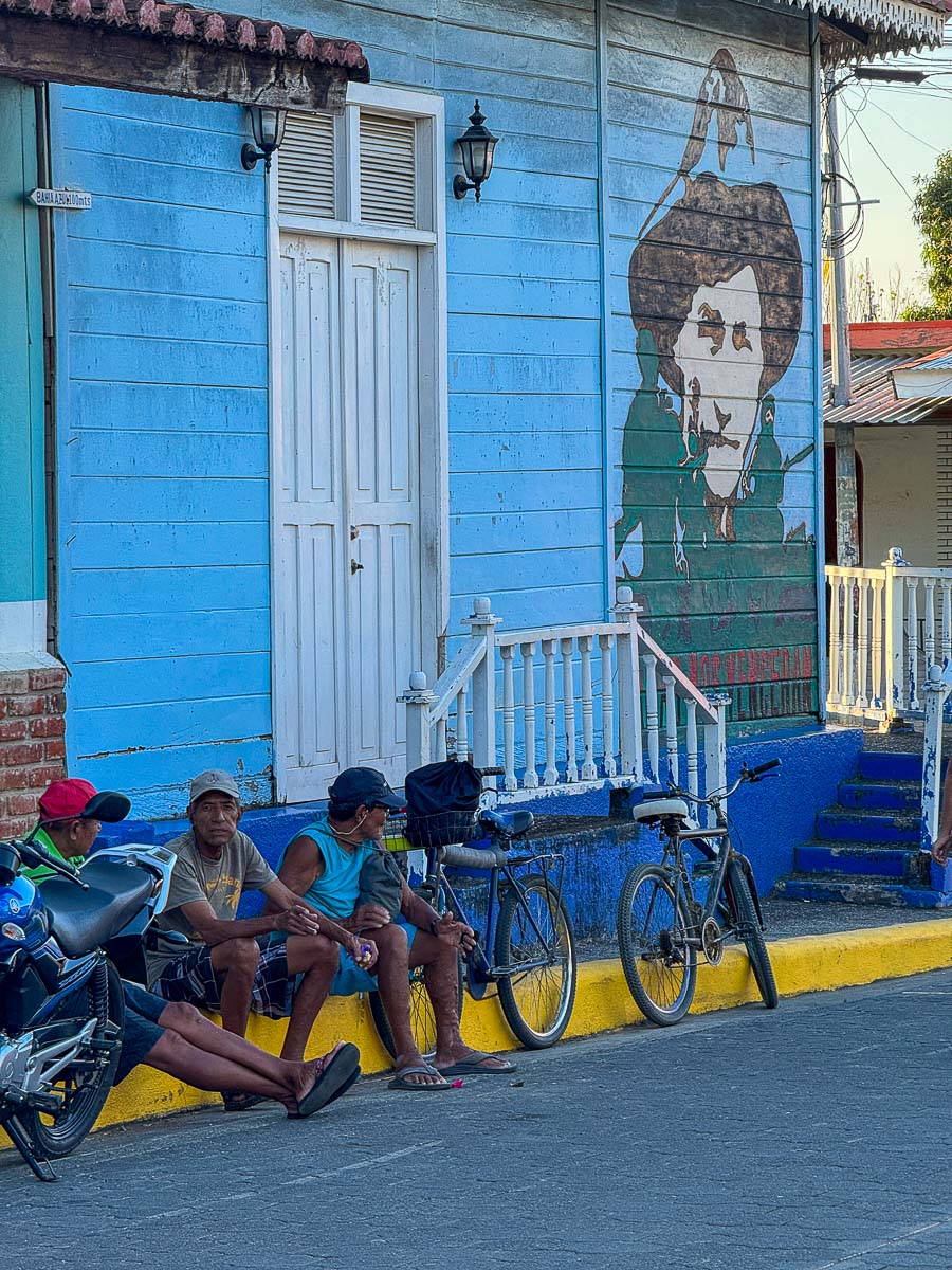 Locals with bikes on a street in San Juan del Sur