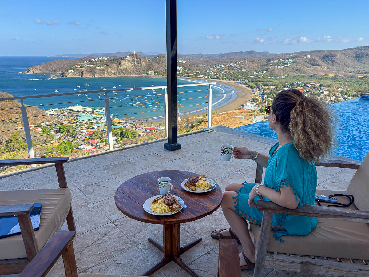 Nina with a Nica breakfast by the pool overlooking San Juan del Sur