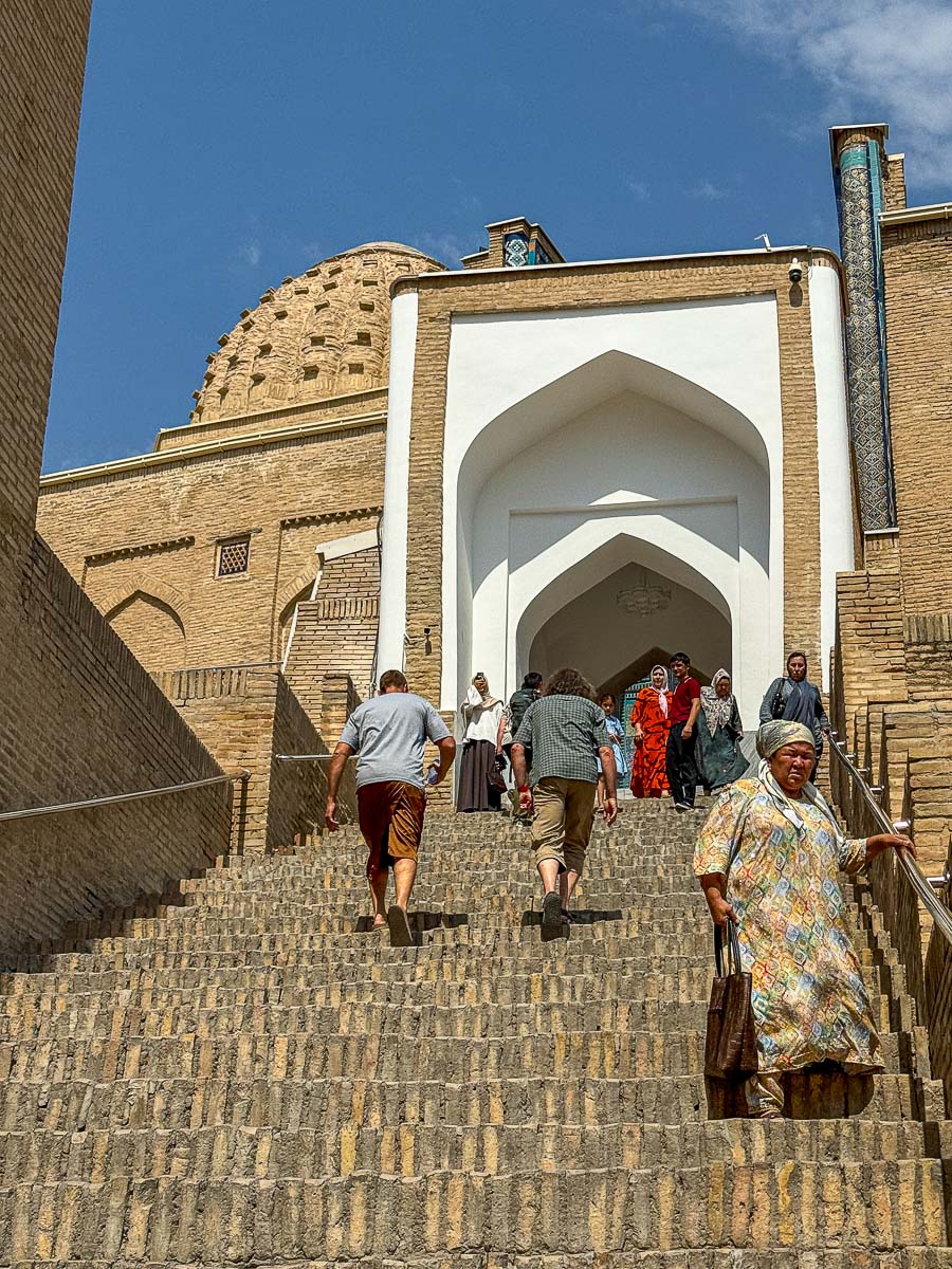 Walking up the stairs into the Shah-i-Zinda necropolis in Samarkand, Uzbekistan