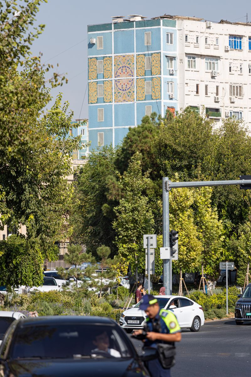 Soviet apartment block covered in a tiled mosaic mural in Tashkent, Uzbekistan