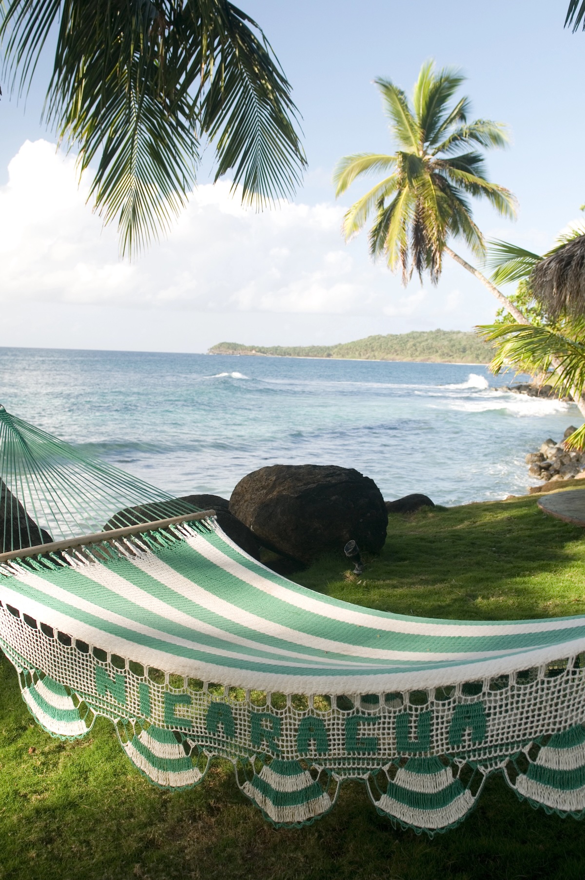 Hammock by the turquoise water on the Corn Islands, Nicaragua